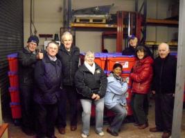 Wells Rotary Club helping to pack water boxes