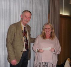 Photo shows Senlac Rotary President, Roger Young, handing the cheque to Jan Barclay from Xtrax