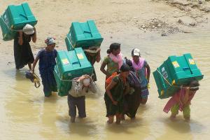 Carrying shelterboxes through a flood