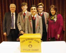 Rotarian John Baden and Jennifer Thornton, Head of Speech and Drama at Highclare School with the winning team in the Intermediate section.
