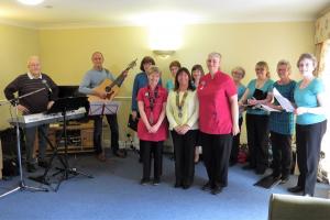 The Harmony Singers with Rotary President Catherine and carers Chris and Jacqui at Bassett House