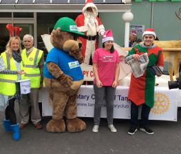 Helping Santa collect toys for needy children in Tameside
