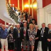 President Anne Hill with guests and fellow Rotarians