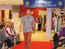 Rotarians and supporters on the catwalk to raise money for charity. Thanks to M&Co.