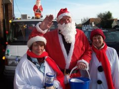 Santa and his 2 helpers