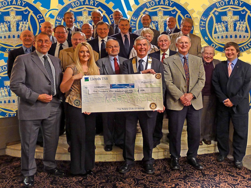 President Frank presents a cheque to Yorkhill 