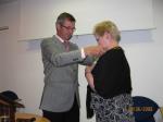 Margaret receives the chain of office from outgoing President David