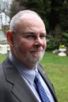 Rtn.&nbsp;Nigel Mills