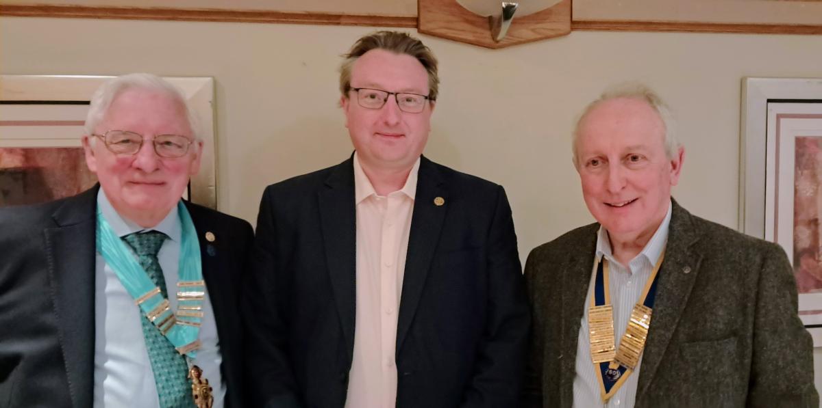 New Member Tom Groves, (Centre) with DG Edwin Partridge (Left ) and President, John Savage (Right)