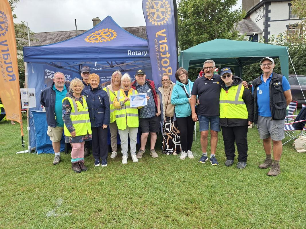 The A Team receiving their Club Excellence Award from DG Brian at Aberaeron Carnival 2026. A brilliant day 