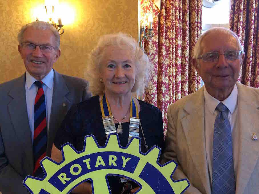 The picture shown Pat with President Diana Loveland and Rtn.Henry Dent