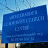 The photograph shows the sign outside the Auchterarder Community Church Centre. which is just opposite the Auchterarder Police Station and the Sandy Gunn Memorial Garden.