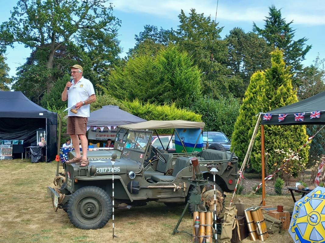 Rotarian Paul Weatherill conducts the Auction