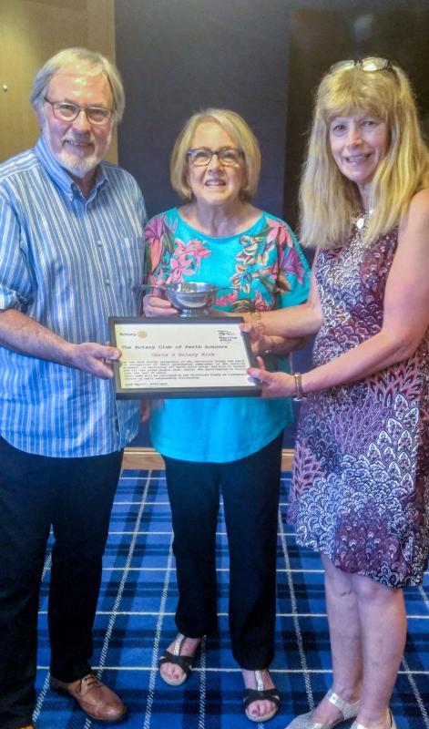Chris and Hilary receive the award from President Anna.