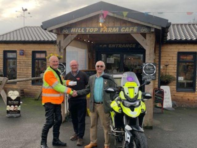 Cheque presentation at Hill Top Farm 