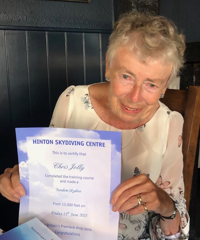 Chris with her cerificate