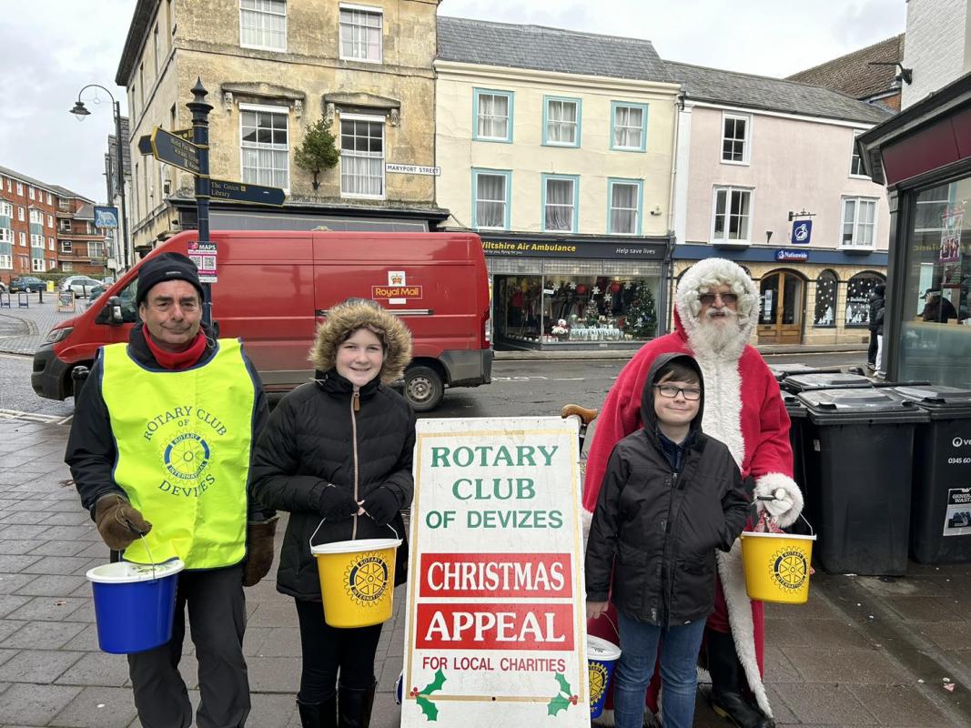 Rotarians and families at street collection 2023