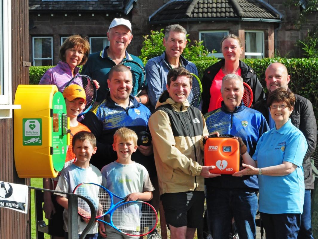 Presenting defibrillator to Cardross Bowling Club