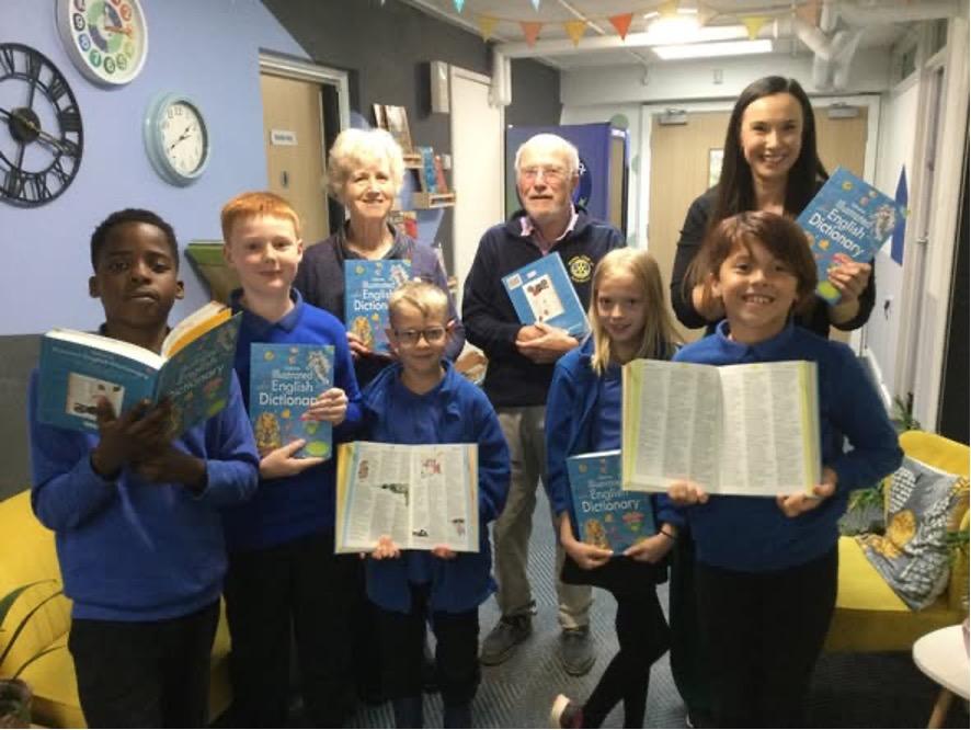 Dictionaries distributed to local school