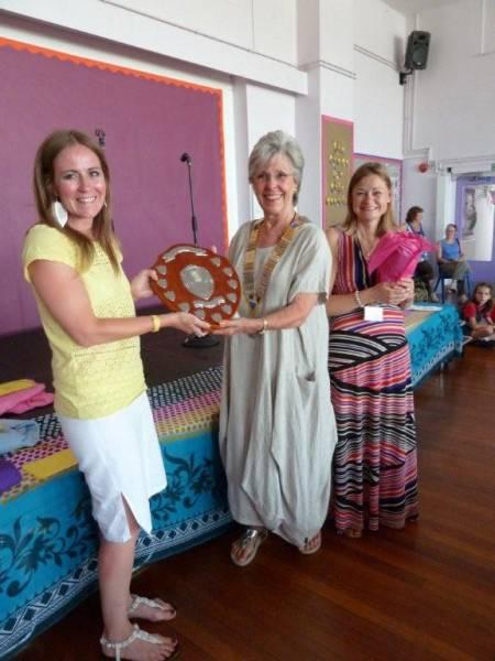 One of the recent Volunteers accepting her award