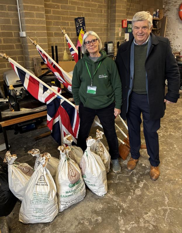 Michael Pellizzaro and Food Bank volunteer, Pat