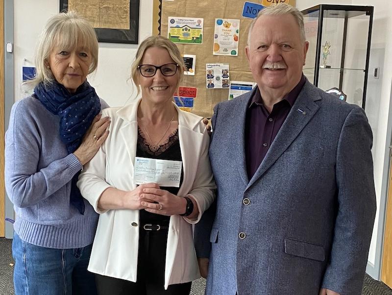 Presenting cheque to CNR Primary Academy