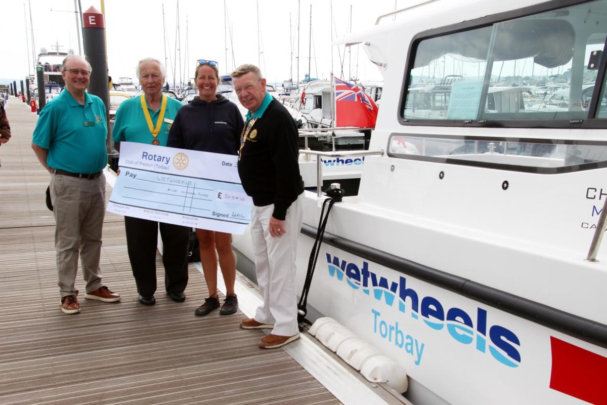 Check presentation from Preston Rotary Club (Torbay) to Wet wheel Charity