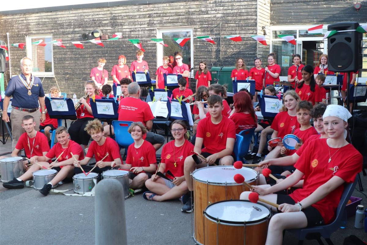 President Mike Barker with members of Seaford Head Band before their concert (Head of Music Dave Faulkner with his back to the camera)