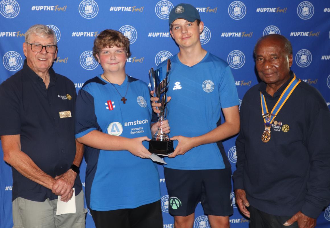 From the left:  Paul Vaesen, Chair of Youth Services, Harvey Wootten, Mason Anderson and President Collins Griffith