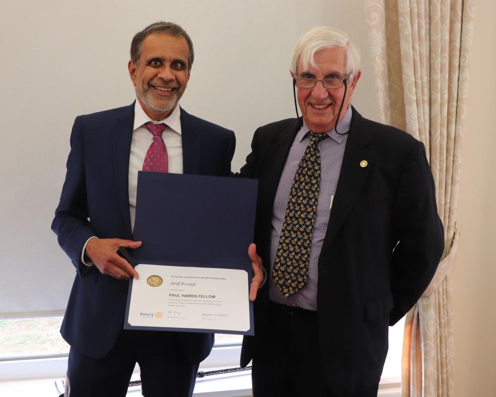 Arif Essaji with his Paul Harris Fellowship Award presented by President Clive Livingstone.