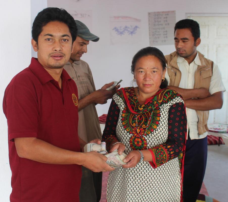 RC Dhulikhel in Nepal with then President Ranjeev distributing loan money.