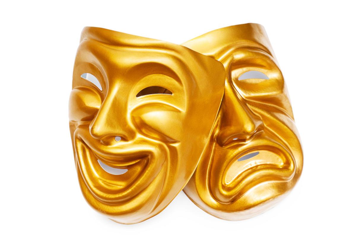 Two golden Greek actors' masks