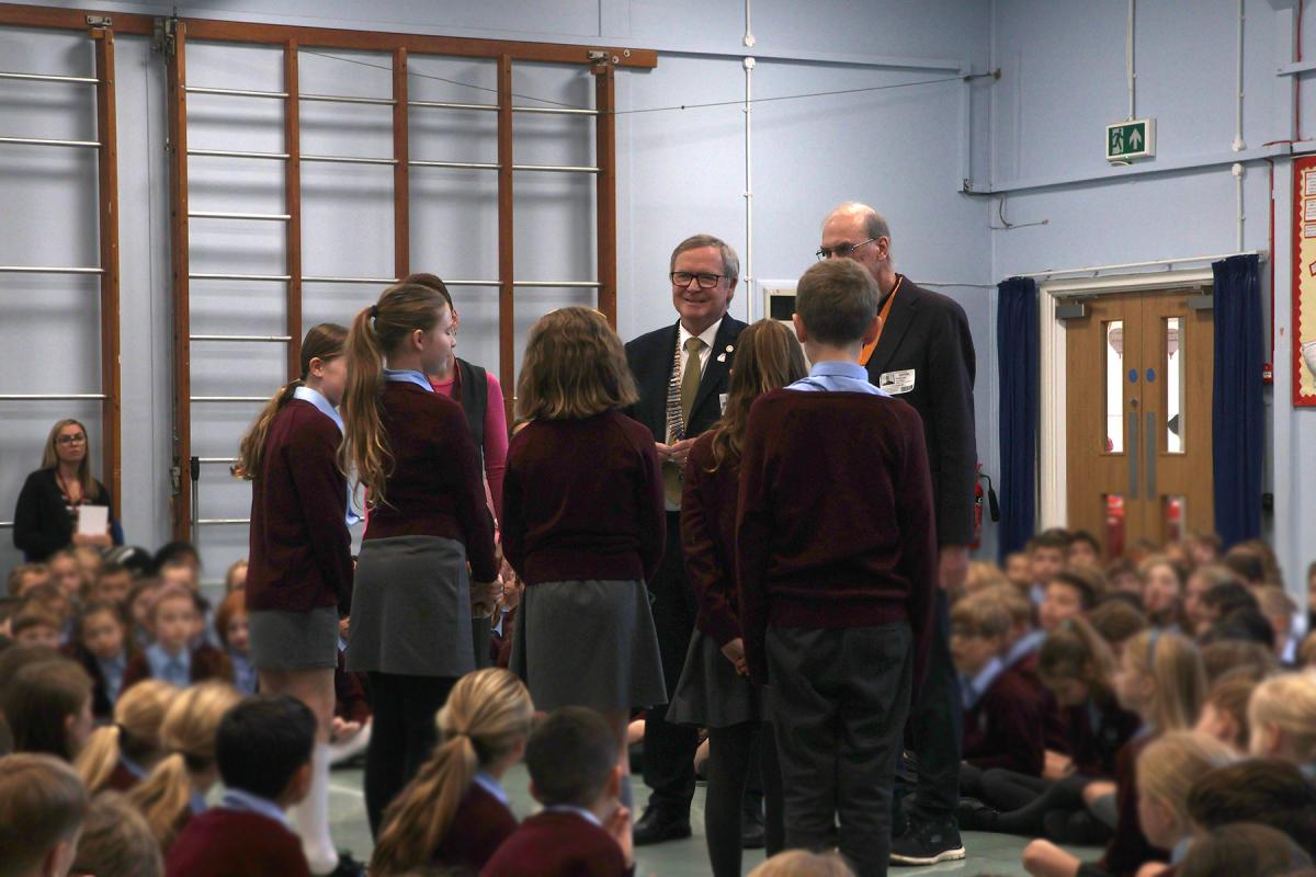 Receiving their badges