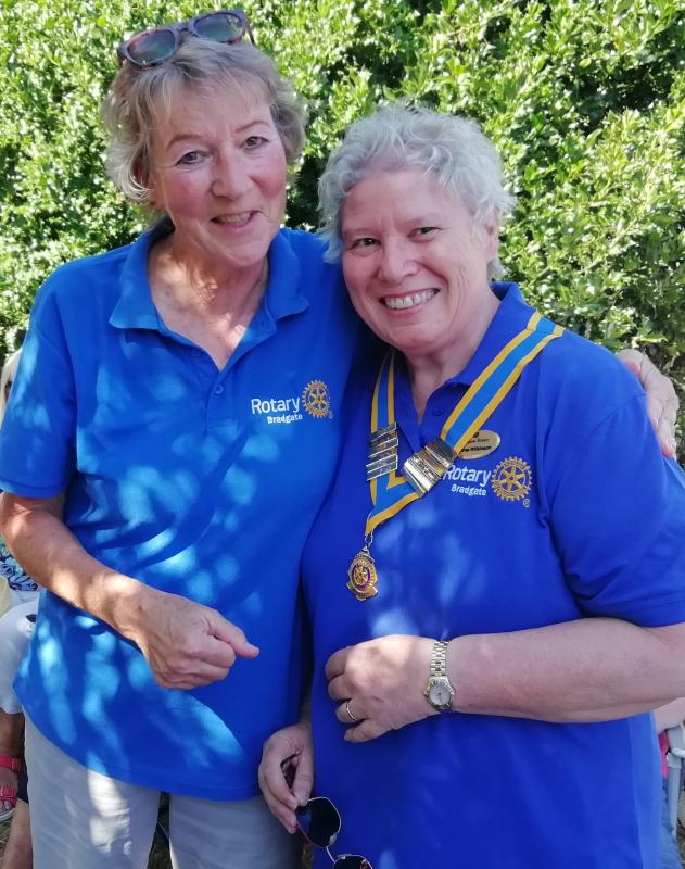 Hugs for past and presidents Nicki Little and Andrea Wilkinson