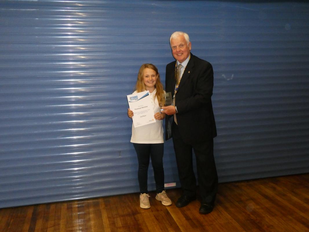 Kinver Rotary President John Brown making the presentation of the award to Penelope Barstow.