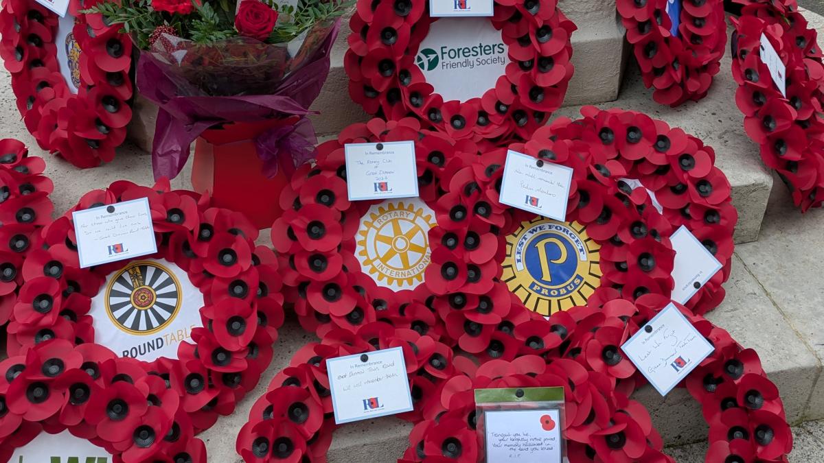 Rotary Club of Dunmow wreath laid amongst others at the Great Dunmow War Memorial.