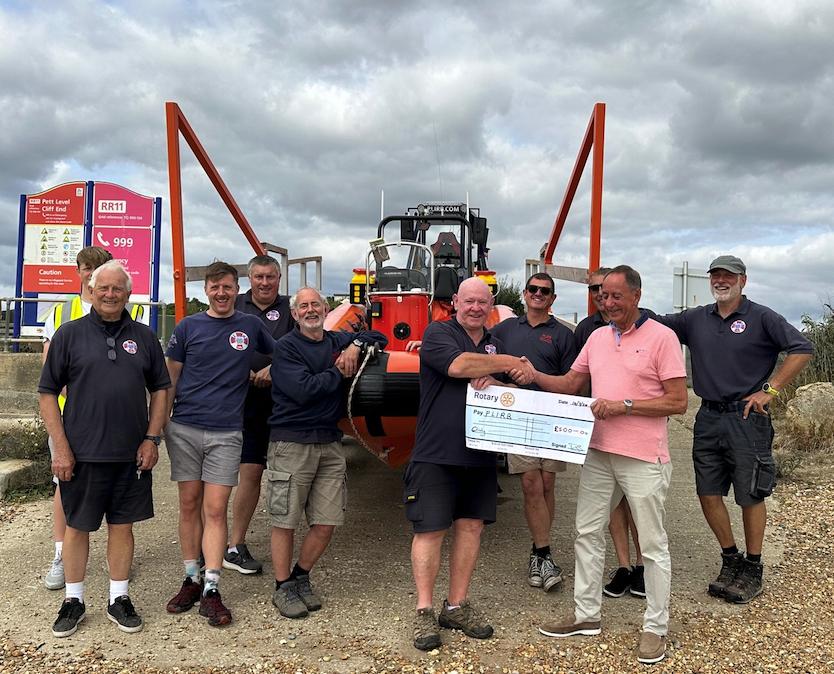 David Dixson presents cheque to the Pett Slipp Buoys