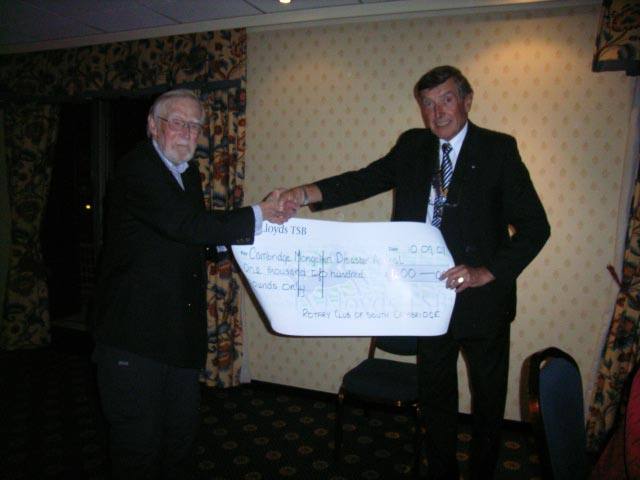 CAMDA CEO John Pirie receiving the cheque from President Alan Edwards