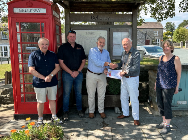 BKV Winners 2025 Bellerby   Shown Left to Right; Jos Huddleston, Jonathan Scott, John Hutchinson (Chair Bellerby PC), John Morton (President Richmond Rotary) and Lynn Watkinson (Clerk, BPC).
