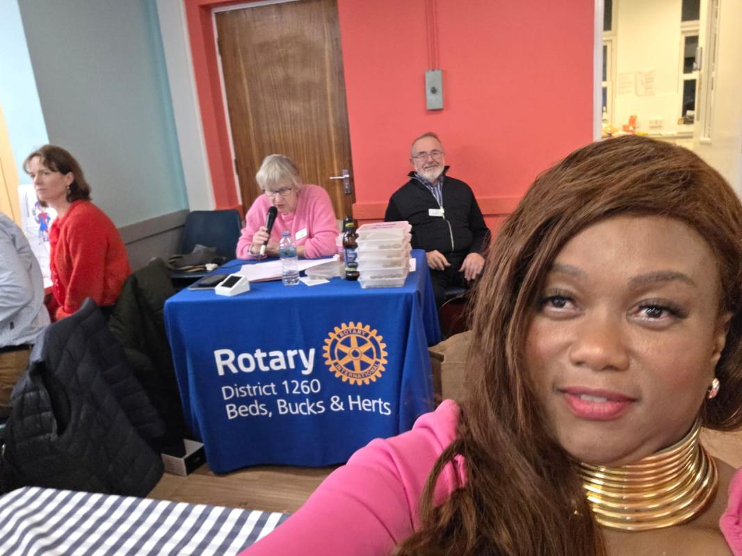 Photo of Quiz Master John Walton Quiz Mistress Coral Walton Raffle Queen Amanda Joseph