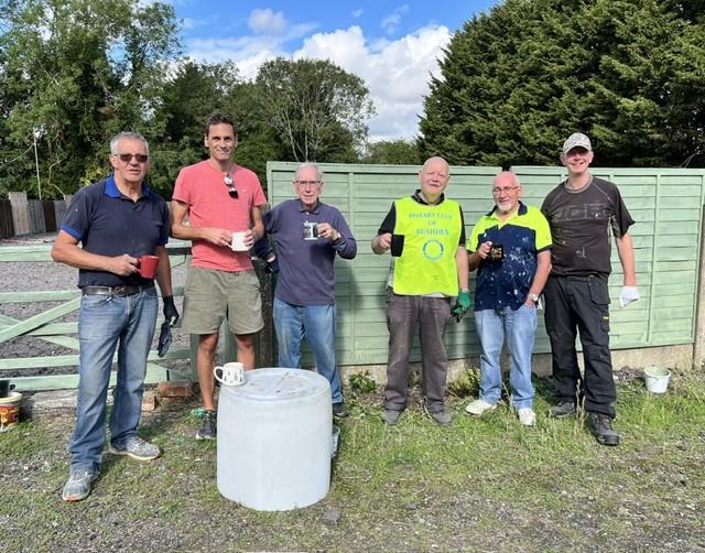Volunteer Rotarians have a well-earned tea break after painting!
