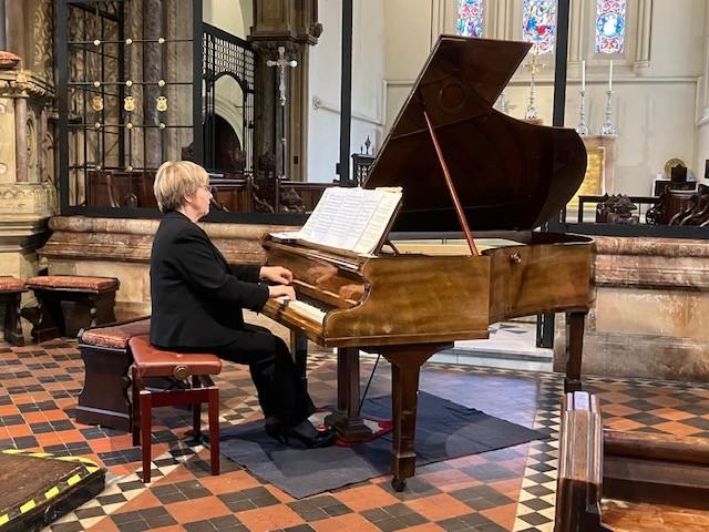 Concert Pianist and Rotarian Marie Pascal entertains a large audience in St Johns Church Taunton - summer 2026