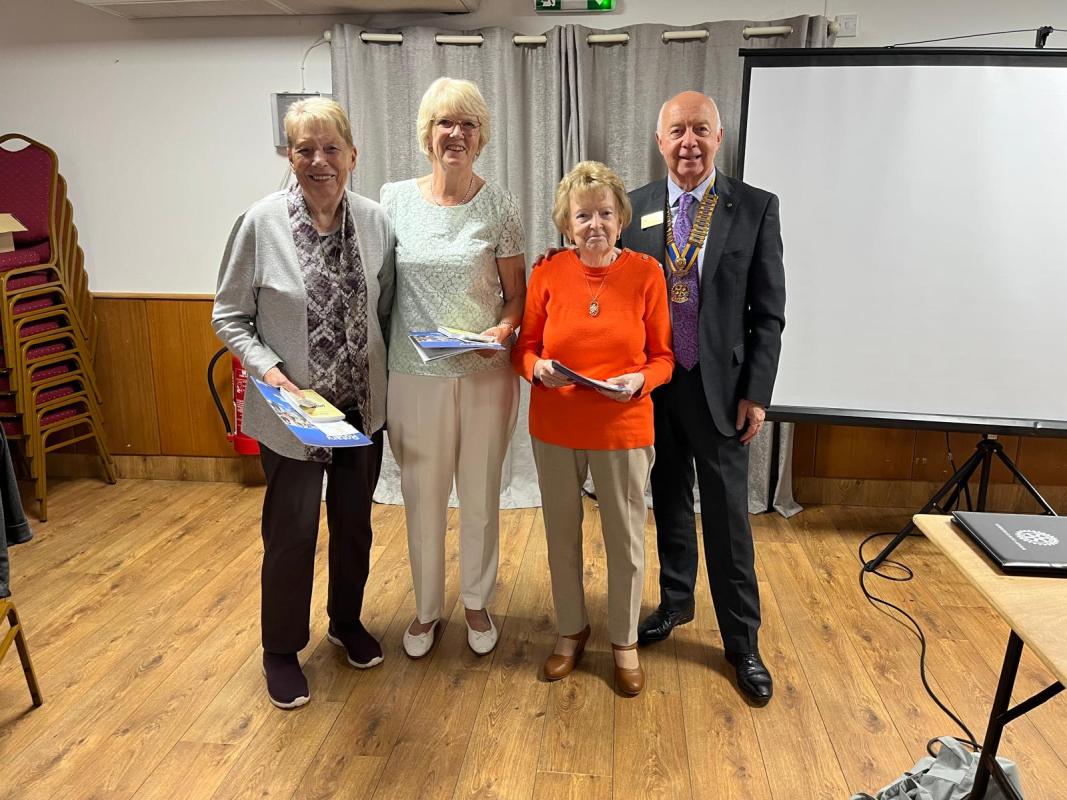 New members pose for a picture with our President Anton