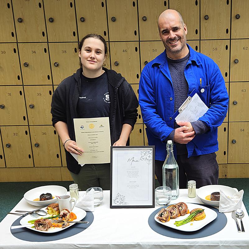 Tom Herbert from The Long Table and the winner Eliza-Grace Keddie in the Archway School Competition