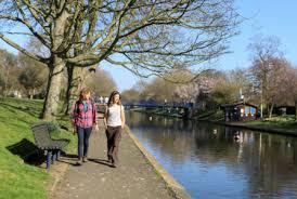 Walk the canal toe path and cross 13 bridges