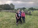 Walkers exiting fields approaching finish