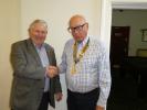 Past President Mike  welcoming the new President
Andrew