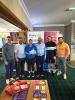 The winning team with President Andrew