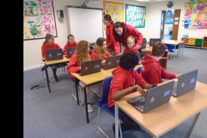 Children using Chromebooks donated by M&P Rotary