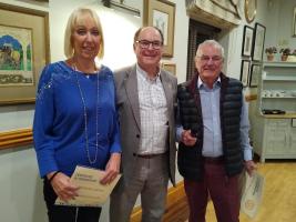 Lesley and Peter Hill are welcomed by President Julian